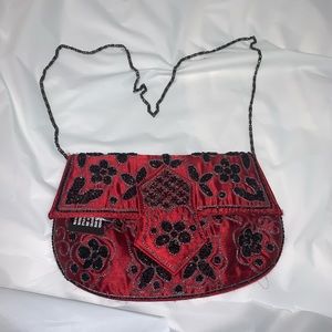 NWT Cami international beaded clutch